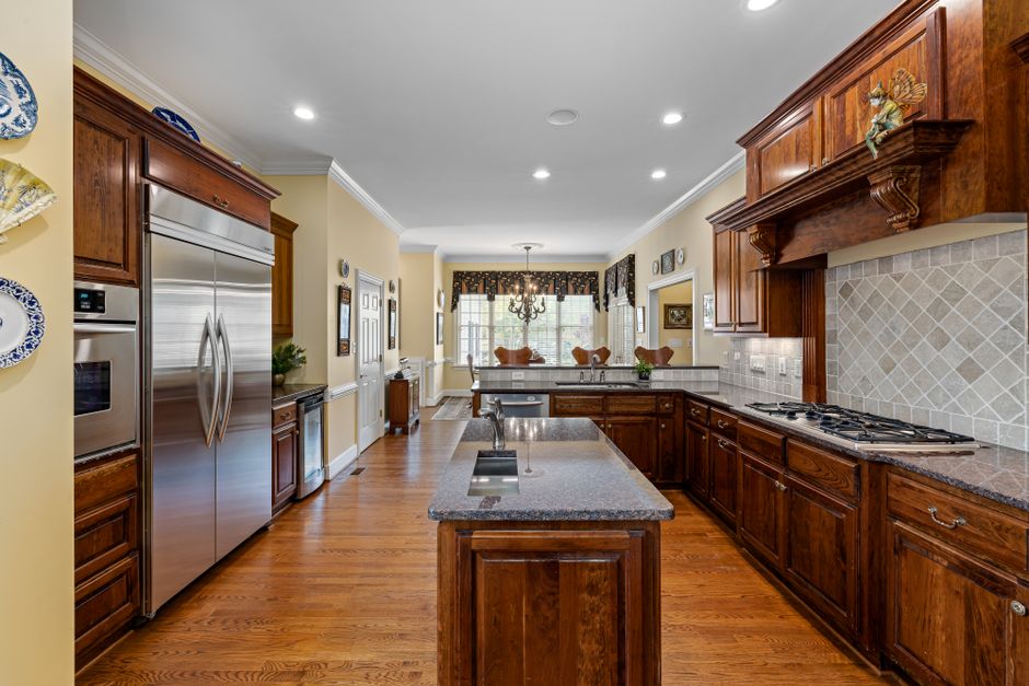 Custom dark wood kitchen cabinets