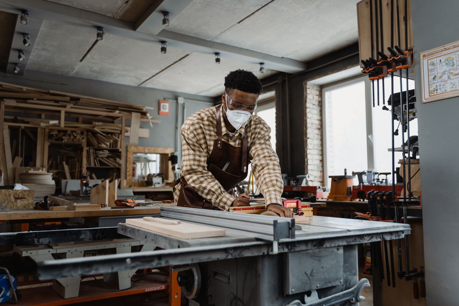 Craftsman at work in wood shop
